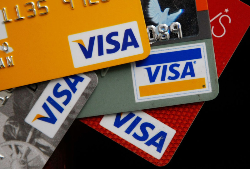Visa Profit Drops 23% as Card Spending Slows