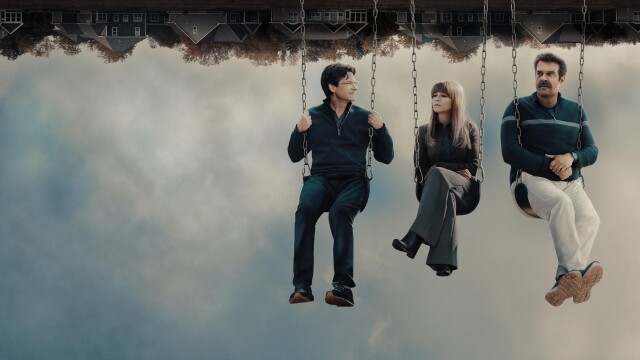Jason Bateman, Linda Cardinelli and David Harbour sitting on swings in front of an upside-down sky scene