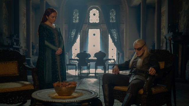 Alicent Hightower stands beside Aemond Targaryen during a meeting in House of the Dragon Season 3.