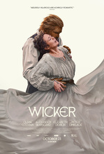 Wicker movie poster showing Olivia Colman embraced by a wicker man, her flowing gray dress filling the bottom of the frame